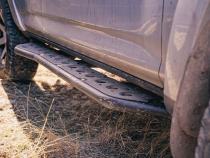 Step Edition Rock Slider For 24-Present Toyota Tacoma/Double Cab Long Bed W/ Kick Out/Yes (Raw Steel)/Powdercoat Cali Raised LED